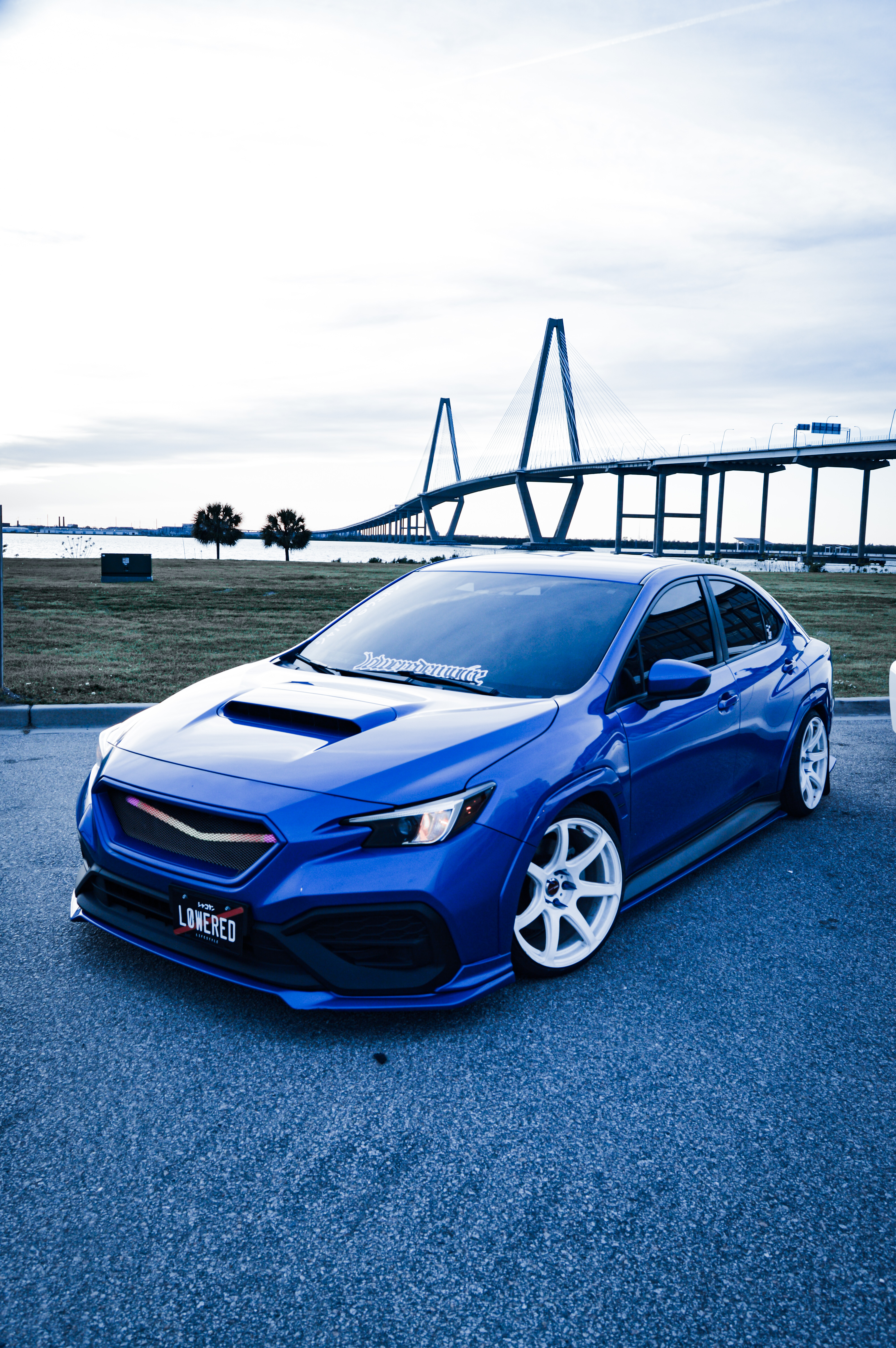 Blacked out BMW M3 at the waterfront