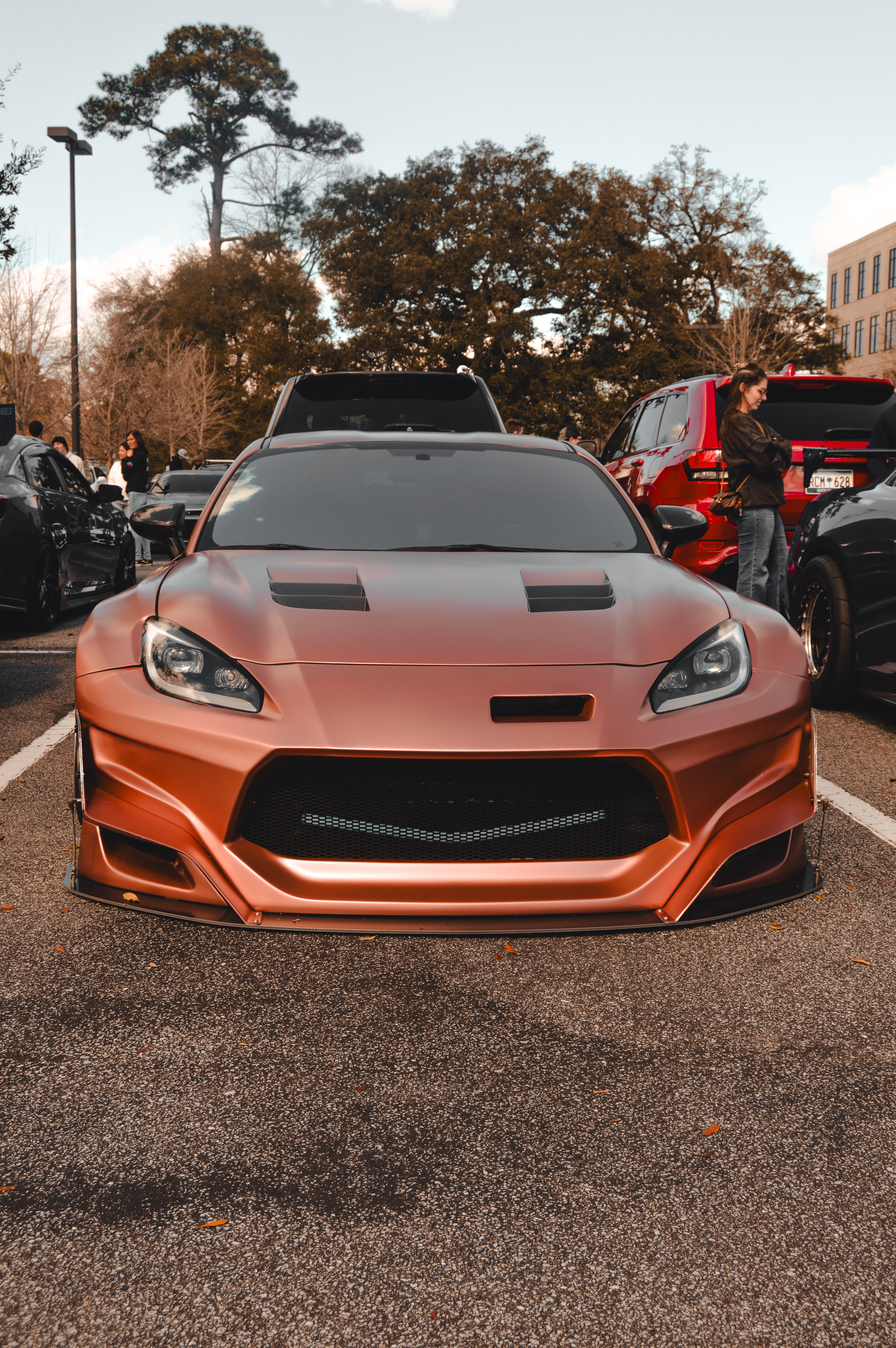 Blue Subaru WRX wide body at the bridge